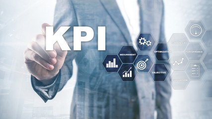 KPI - Key Performance Indicator. Business and technology concept. Multiple exposure, mixed media. Financial concept on blurred background.