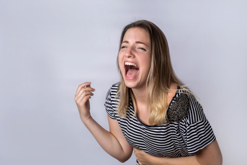Young woman laughing.