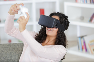 happy woman using a virtual reality headset
