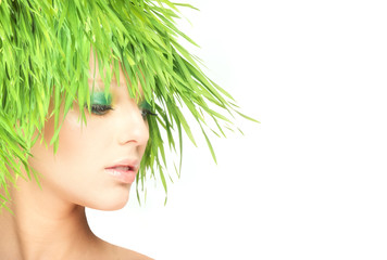Nature beauty woman with fresh grass hair