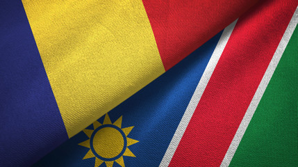 Fototapeta premium Romania and Namibia two flags textile cloth, fabric texture