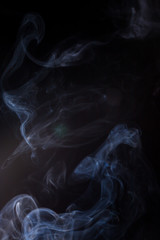 Smoke on a black background.
