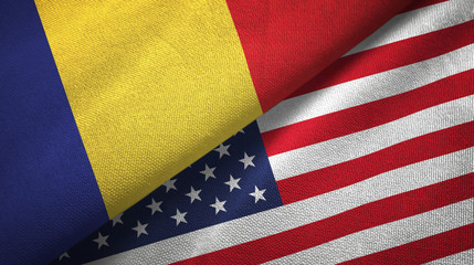 Obraz premium Romania and United States two flags textile cloth, fabric texture