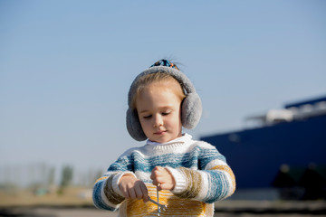 Little girl with a wrench