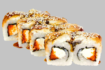 Philadelphia sushi roll with eel and unagi sauce Tobiko caviar tobiko and sesame