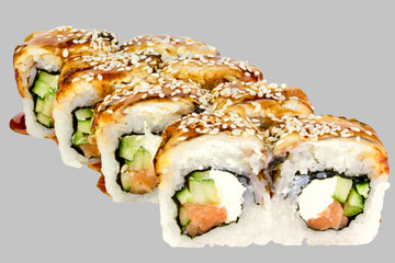 sushi roll Canada with salmon cheese eel sesame cucumber unagi sauce