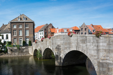 Fototapeta na wymiar Maria Theresia Bridge or Stenen Brug across river Roer in Roermand, The Netherlands