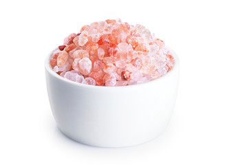 Fototapeta na wymiar Bowl with himalayan pink salt isolated on white background.