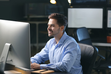 Male programmer working in office