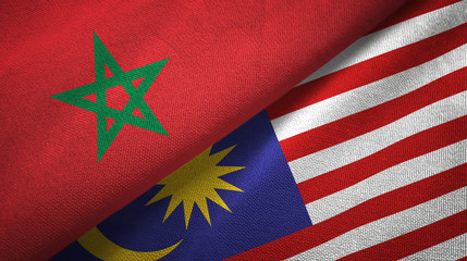 Fototapeta premium Morocco and Malaysia two flags textile cloth, fabric texture