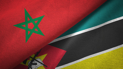 Fototapeta na wymiar Morocco and Mozambique two flags textile cloth, fabric texture