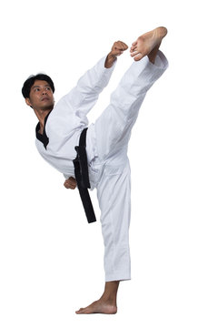 Master Black Belt TaeKwonDo Handsome Man Instructor Teacher Fighter Show Hit Pose, Studio Lighting White Background Isolated.  White Formal Fighting Suit, Motion Blur Hand Foots On Taekwondo Post.