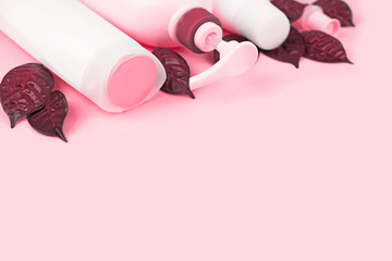 A set of cosmetics for the body tinted image coral.