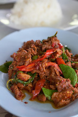 Spicy fried deer Thailand food on blue plate