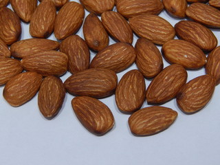 Almond on white background. Macro photography