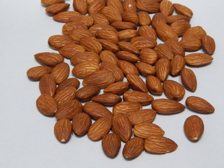 Almond on white background. Macro photography