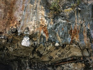 Thailand , Phuket. Stone grotto in the middle of the sea and water, tourist route