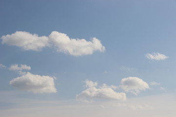 World-outlook breathing in the fresh air, you feel the approach of spring. the concept world-outlook. Spring bright blue sky with small clouds in the sun rays. 