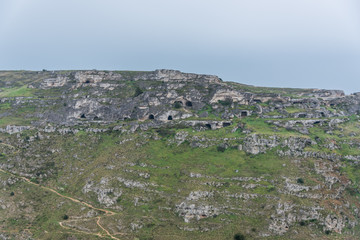 Caves in a Mountain at The Ancient City of Matera, Italy