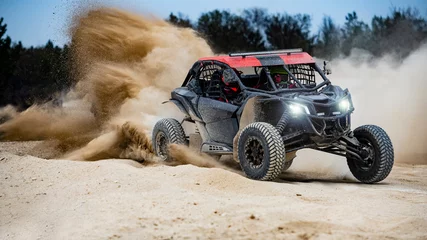 Foto op Canvas UTV buggy in the action on sand © KopoPhoto