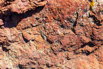 Stone rock in the mountains as a background