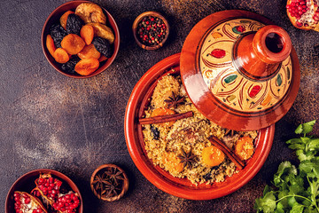 Traditional moroccan tajine of chicken with dried fruits and spices.