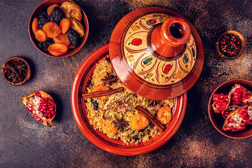 Traditional moroccan tajine of chicken with dried fruits and spices.