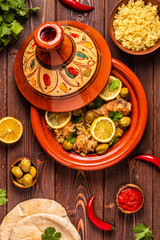 Fototapeta premium Traditional moroccan tajine of chicken with salted lemons, olives
