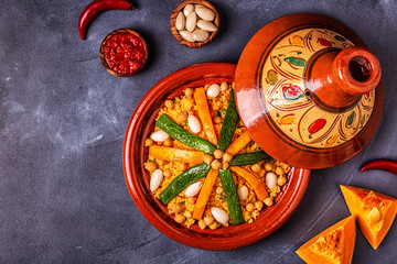 Obraz na płótnie Canvas Vegetable tagine with almond and chickpea couscous