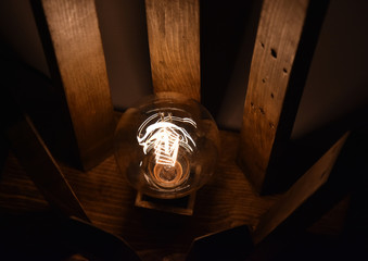 Handmade wooden lamp with retro edison bulb