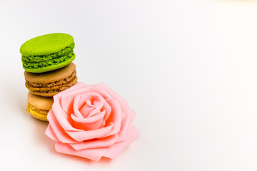 Macaroons fresh colorful close up. French dessert food background.