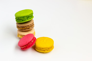 Macaroons fresh colorful close up. French dessert food background.