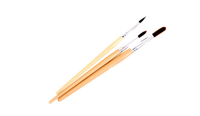 Painting brushes. Drawing tools, paint brushes on white background, copy space, top view
