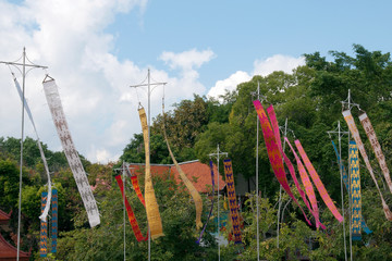 Chiang Mai Thailand, colourful banners flying at Wat Chedi Luang