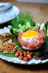 Sour pork : Thai northeastern style food which mixed pork rice garlic sugar and salt 