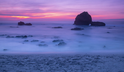 Fototapeta na wymiar sunset and waves on the beach in Biarritz France