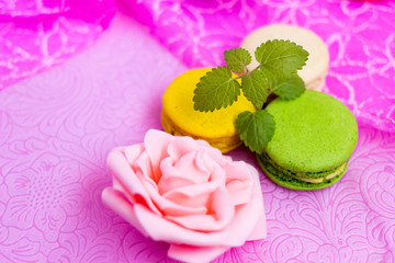 Macaroons fresh colorful close up. French dessert food background.
