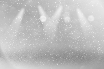 Obraz premium red fantastic shining glitter lights defocused stage spotlights bokeh abstract background with sparks fly, festal mockup texture with blank space for your content