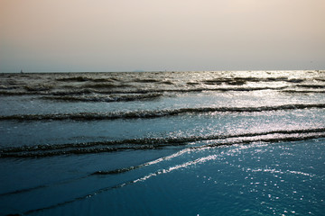 Sea waves at the beach in the evening