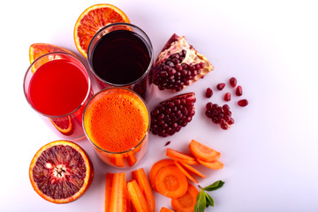 Set of healthy fresh drinks on the white background. Raw drinks and foods.