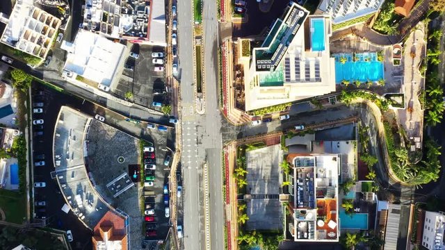 Aerial city view with roads, houses, buildings, and parking lots. Limassol, Cyprus