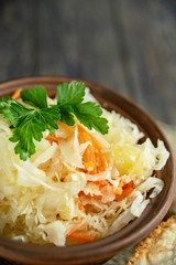 salad homemade sauerkraut in a glass jar on a table