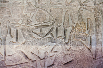 Stone Carving, all around on the wall at Angkor wat.