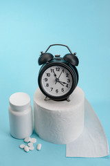Medicine drugs, paper and clock