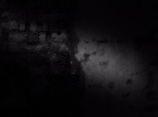 The black Old surface of concrete and bricks.