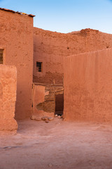 Orange colored abandoned house in Morocco countryside (Tinghir area)