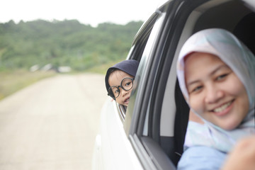 Mom and Baby Girl Daughter on Car Trip