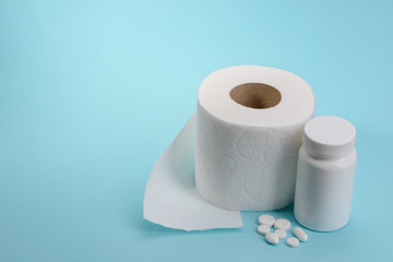 Toilet paper roll and pills