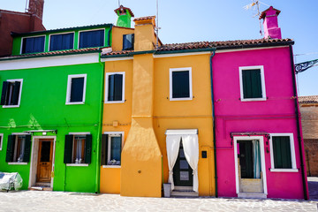Fototapeta na wymiar Multi coloured houses in Burano, Venice lagoon, Italy
