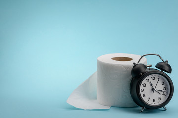 Toilet paper and alarm clock